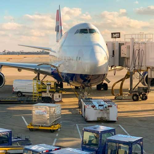 white airliner on tarmack